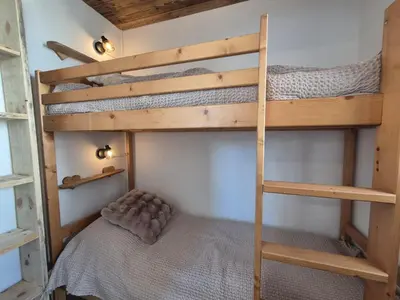 Un ou plusieurs lits dans un hébergement de l'établissement RPP A119 ski au pied appartement 6pers