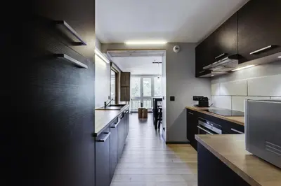 Cuisine ou kitchenette dans l'établissement Résidence Aiguille Du Grand Fond - Deux pièces + cabine 6 personnes MAE-7953