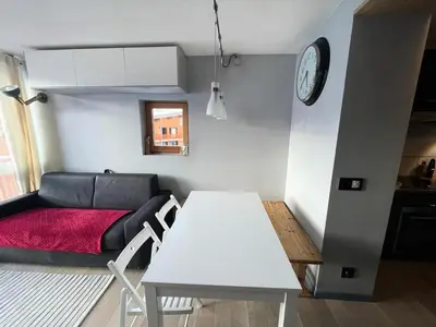 Coin salon dans l'établissement Résidence Aiguille Du Grand Fond - Deux pièces + cabine 6 personnes MAE-7953