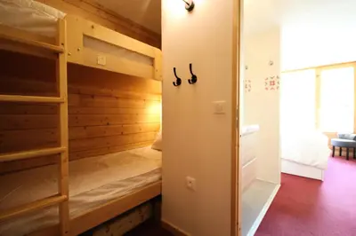 Un ou plusieurs lits dans un hébergement de l'établissement Résidence Lauzieres - Appartement rénové 3 pièces 7 personnes MAE-4794