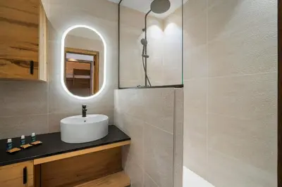 Salle de bains dans l'établissement Appartement Le Névé - Vue lac