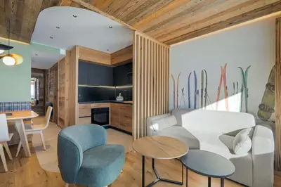 Coin salon dans l'établissement Appartement Le Névé - Vue lac