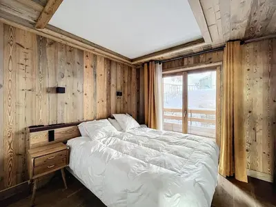 Un ou plusieurs lits dans un hébergement de l'établissement Appartement spacieux 4 chambres avec WIFI à Val-d'Isère - FR-1-519-42