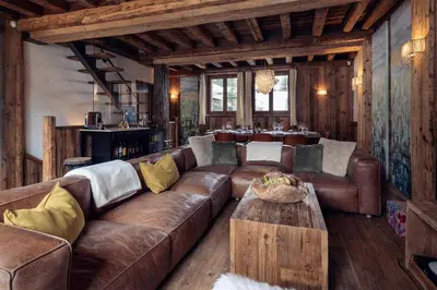 Coin salon dans l'établissement Madame Vacances Chalet Genepy