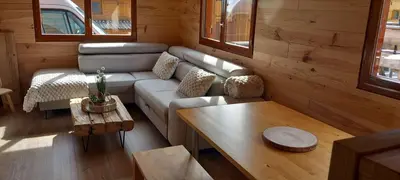 Coin salon dans l'établissement Chalet le TI-KER BREIZH Camping La Buidonnière Aussois