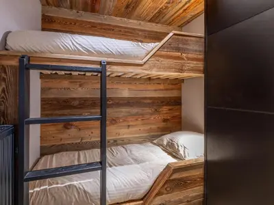 Un ou plusieurs lits dans un hébergement de l'établissement Appartement rénové avec WiFi à Val-d'Isère - FR-1-694-434