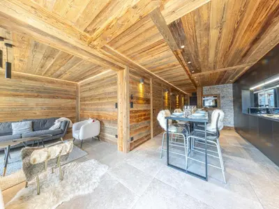 Coin salon dans l'établissement Appartement rénové avec WiFi à Val-d'Isère - FR-1-694-434