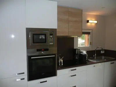 Cuisine ou kitchenette dans l'établissement Les Chalets Du Jardin Alpin