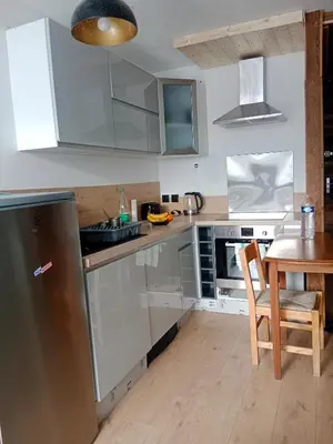 Cuisine ou kitchenette dans l'établissement Studio montagne