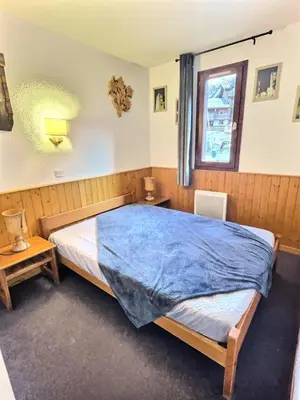 Un ou plusieurs lits dans un hébergement de l'établissement Résidence Les Jardins De Val - Appartement 2 pièces Cabine 6 personnes à Val d'isère à 350m du centre du village et 450m des pistes, place de parking incluse MAE-2664