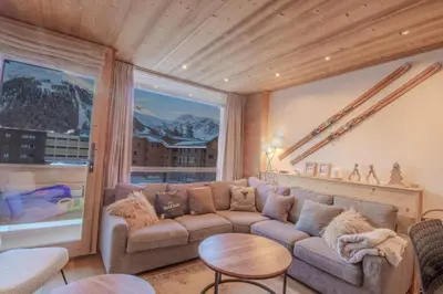 Coin salon dans l'établissement Superbe appartement lumineux et spacieux au coeur de Val d'Isère