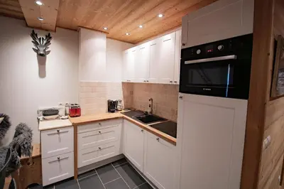 Cuisine ou kitchenette dans l'établissement Superbe appartement lumineux et spacieux au coeur de Val d'Isère