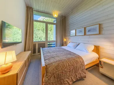 Un ou plusieurs lits dans un hébergement de l'établissement Duplex de luxe 5 pièces pour 8 personnes à Val-d'Isère, WiFi inclus - FR-1-694-439