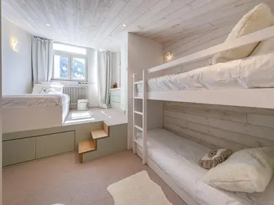 Un ou plusieurs lits dans un hébergement de l'établissement Duplex de luxe 5 pièces pour 8 personnes à Val-d'Isère, WiFi inclus - FR-1-694-439