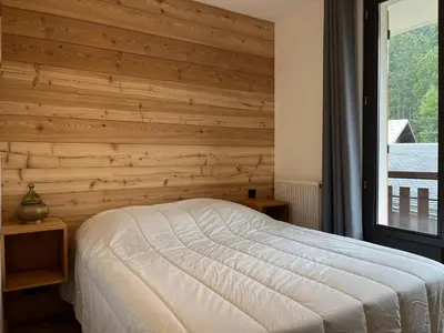Un ou plusieurs lits dans un hébergement de l'établissement Appartement rénové proche centre, 3 pièces, balcon - FR-1-464-250