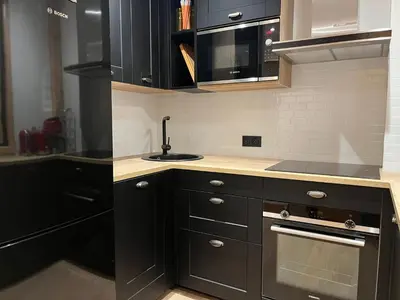 Cuisine ou kitchenette dans l'établissement Appartement rénové proche centre, 3 pièces, balcon - FR-1-464-250