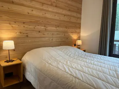 Un ou plusieurs lits dans un hébergement de l'établissement Appartement rénové proche centre, 3 pièces, balcon - FR-1-464-250