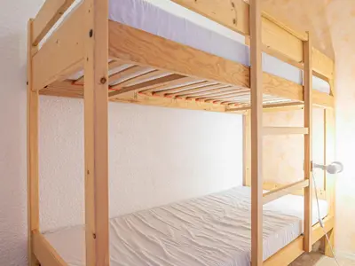 Un ou plusieurs lits dans un hébergement de l'établissement Studio cabine cosy pour 4 pers avec balcon et parking à Aussois - FR-1-840-49