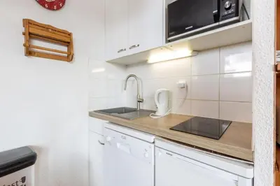 Cuisine ou kitchenette dans l'établissement Chantelouve 319