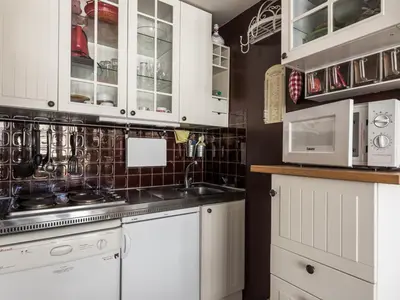 Cuisine ou kitchenette dans l'établissement Studio lumineux skis aux pieds avec balcon à Tignes - FR-1-502-594