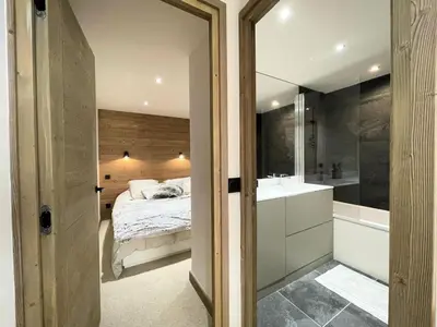 Un ou plusieurs lits dans un hébergement de l'établissement Résidence Le Dome - Appartement duplex renove · Centre station MAE-1543