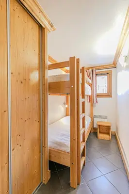 Un ou plusieurs lits dans un hébergement de l'établissement Résidence Le Criterium - Résidence Le Critérium 3 Chalet C Appartement 6 MAE-1893