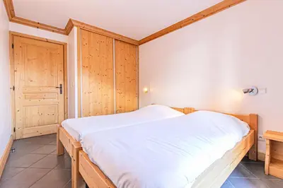 Un ou plusieurs lits dans un hébergement de l'établissement Résidence Le Criterium - Résidence Le Critérium 3 Chalet C Appartement 6 MAE-1893
