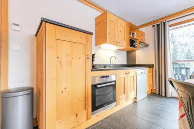 Cuisine ou kitchenette dans l'établissement Résidence Le Criterium - Résidence Le Critérium 3Chalet E Appartement 3 MAE-1913