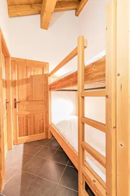 Un ou plusieurs lits dans un hébergement de l'établissement Résidence Le Criterium - Résidence Le Critérium 3Chalet D Appartement 17 MAE-1943