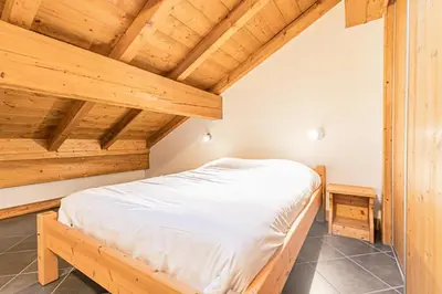 Un ou plusieurs lits dans un hébergement de l'établissement Résidence Le Criterium - Résidence Le Critérium 3Chalet D Appartement 17 MAE-1943