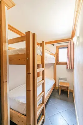 Un ou plusieurs lits dans un hébergement de l'établissement Résidence Le Criterium - Résidence Le Critérium 3 Chalet A Appartement 1 MAE-1993