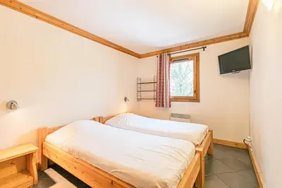 Un ou plusieurs lits dans un hébergement de l'établissement Résidence Le Criterium - Résidence Le Critérium 3 Chalet A Appartement 1 MAE-1993