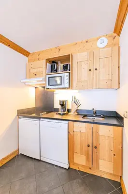 Cuisine ou kitchenette dans l'établissement Résidence Le Criterium - Résidence Le Critérium 3Chalet D Appartement 12 MAE-2003