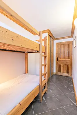 Un ou plusieurs lits dans un hébergement de l'établissement Résidence Le Criterium - Résidence Le Critérium 3Chalet D Appartement 12 MAE-2003