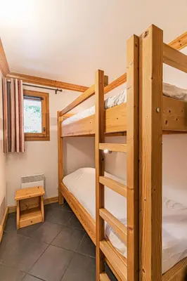 Un ou plusieurs lits dans un hébergement de l'établissement Résidence Le Criterium - Résidence Le Critérium 3 Chalet A Appartement 3 MAE-2033