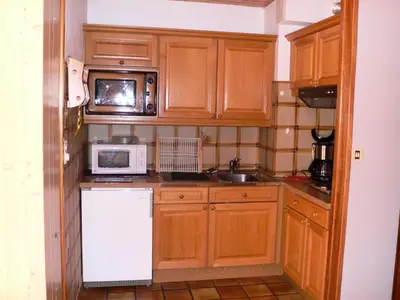 Cuisine ou kitchenette dans l'établissement Résidence Immeuble Rue Tournaz - Studio bien agencé et bien situé MAE-2093