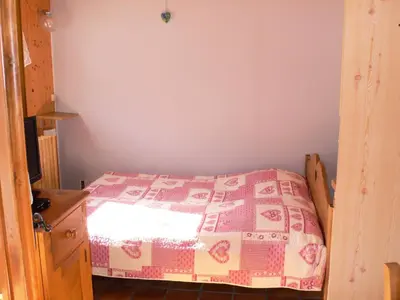 Un ou plusieurs lits dans un hébergement de l'établissement Résidence Immeuble Rue Tournaz - Studio bien agencé et bien situé MAE-2093