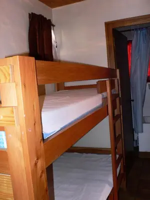 Un ou plusieurs lits dans un hébergement de l'établissement Résidence Immeuble Rue Tournaz - Studio bien agencé et bien situé MAE-2093