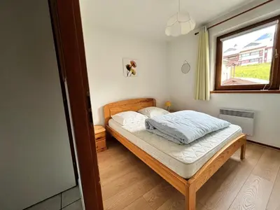 Un ou plusieurs lits dans un hébergement de l'établissement Résidence Les Balcons Des Curtious - Appartement 2 pièces coin montagne - 4 personnes MAE-2103