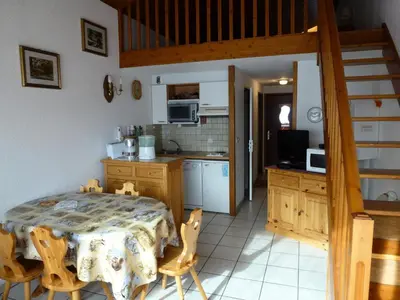 Cuisine ou kitchenette dans l'établissement Résidence Les Balcons Des Curtious - Studio mezzanine - 4 personnes MAE-2113