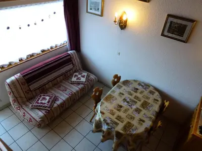 Un ou plusieurs lits dans un hébergement de l'établissement Résidence Les Balcons Des Curtious - Studio mezzanine - 4 personnes MAE-2113