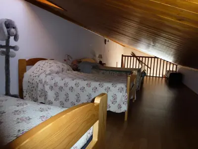 Un ou plusieurs lits dans un hébergement de l'établissement Résidence Les Balcons Des Curtious - Studio mezzanine - 4 personnes MAE-2113