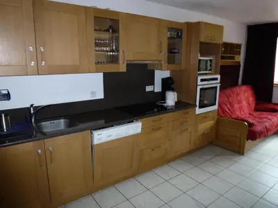 Cuisine ou kitchenette dans l'établissement Résidence Les Balcons Des Curtious - Appartement 8 personnes bien équipé MAE-2163