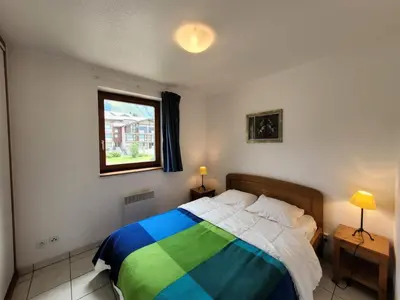 Un ou plusieurs lits dans un hébergement de l'établissement Résidence Les Balcons Des Curtious - Appartement 8 personnes bien équipé MAE-2163