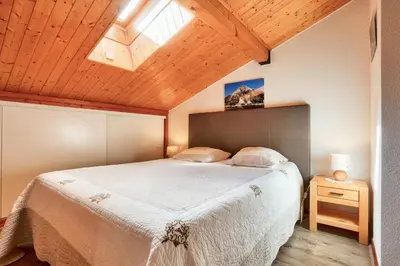 Un ou plusieurs lits dans un hébergement de l'établissement Résidence Les Balcons Des Curtious - Appartement 3 pièces - 6 personnes MAE-2183