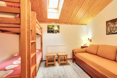 Un ou plusieurs lits dans un hébergement de l'établissement Résidence Les Balcons Des Curtious - Appartement 3 pièces - 6 personnes MAE-2183