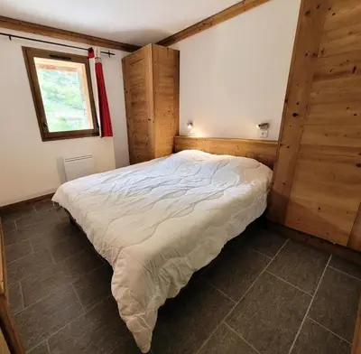 Un ou plusieurs lits dans un hébergement de l'établissement Résidence La Bergerie - Appartement 2 pièces chaleureux et bien équipé MAE-2243