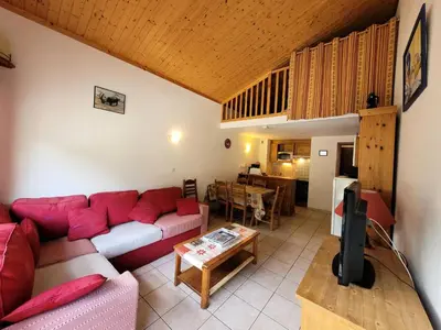 Coin salon dans l'établissement Résidence Les Balcons Des Curtious - Appartement 3 pièces mezzanine - 8 personnes MAE-2263