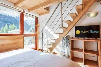 Un ou plusieurs lits dans un hébergement de l'établissement Résidence Les Balcons Des Curtious - Appartement 3 pièces mezzanine - 8 personnes MAE-2263
