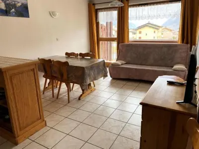 Coin salon dans l'établissement Résidence Les Balcons Des Curtious - 3 Pièces pour 6 Personnes MAE-2283